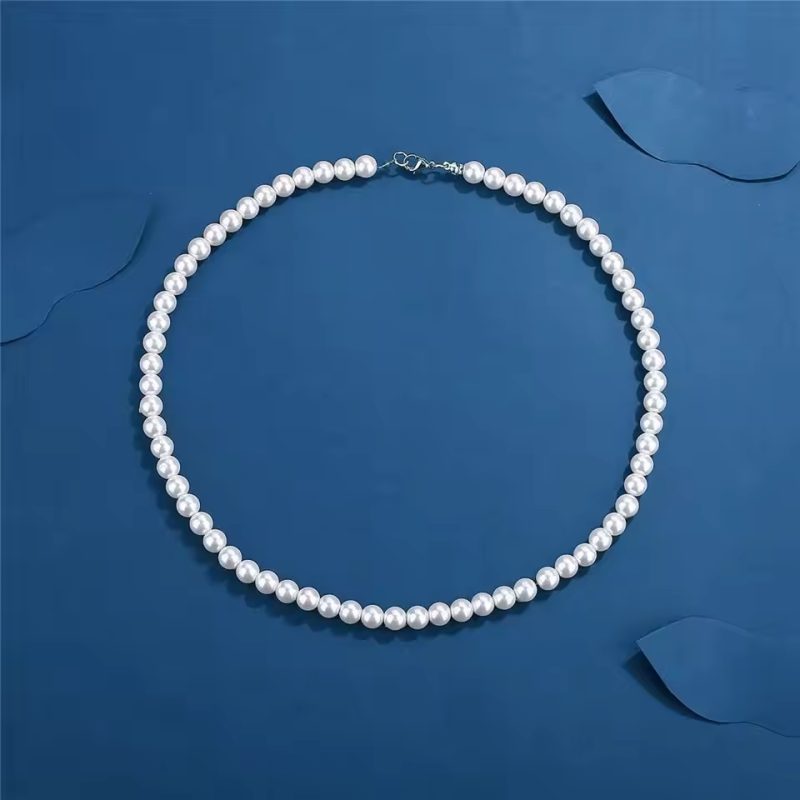 Collier homme avec perles noires élégantes, finition raffinée, parfait pour un style sophistiqué et tendance.